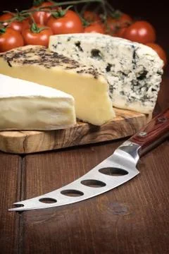Cheese and tomatoes. Vertically. Stock Photos