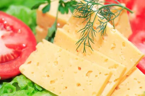 Cheese and vegetables Stock Photos