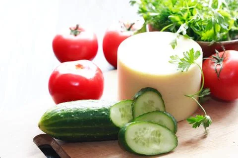 Cheese and vegetables Stock Photos