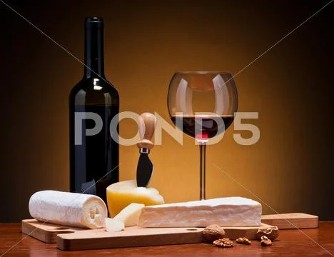 Cheese and wine Stock Photos
