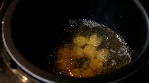 Cheese balls. Potato balls. Puffs snack. Fast food. Potato croquettes. Crisp Stock Footage 103405553