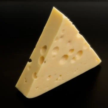 Cheese on black Stock Photos