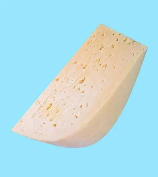 Cheese on Blue Background Stock Photos