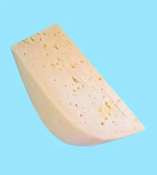 Cheese on Blue Background Stock Photos