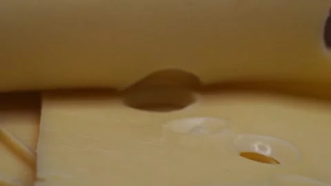 Cheese on a Board with holes to stick on a fork Stock Footage 140110636