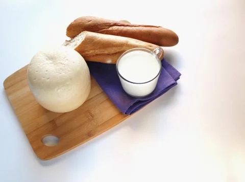 Cheese with bread and milk Stock Photos
