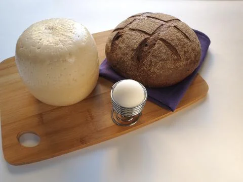 Cheese with bread and milk Foto stock
