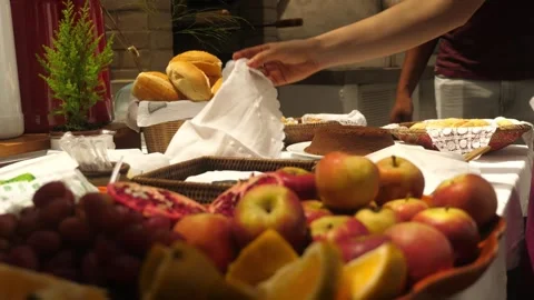 Cheese bread is served at breakfast table with tropical fruits Stock Footage 272315215