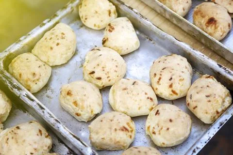 Cheese bread in several tin trays Stock Photos