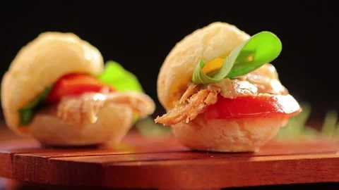 Cheese bread stuffed with turkey breast, creamy curd and arugula Stock Footage 130454266