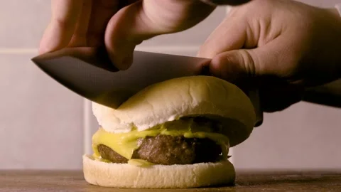 Cheese Burger cut in half Stock Footage 132036958