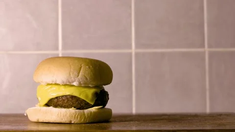 Cheese burger put together Stock Footage 132036948