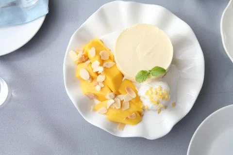 Cheese cake with mango Stock Photos
