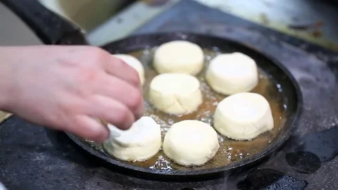 Cheese cakes fried in a pan Video stock 72744003