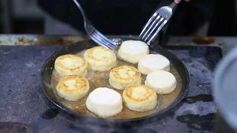 Cheese cakes fried in a pan Video stock 72857700