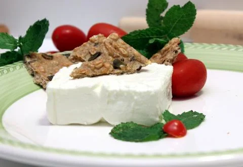 Cheese with crakers Stock Photos