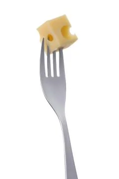 Cheese cube on a fork against white Stock Photos