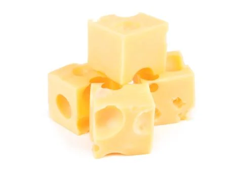 Cheese cube slice isolated on a white background Stock Photos