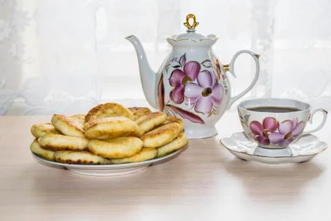 Cheese, a cup of herb tea Stock Photos