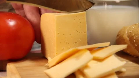 Cheese cut, piece Stock Footage 75763304