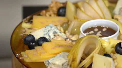 Cheese dish decorated with mint. slow motion Video stock 101420406