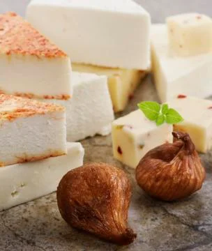 Cheese with dried figs Stock Photos