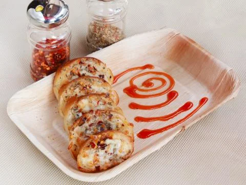 Cheese garlic bread with chilli flakes Stock Photos