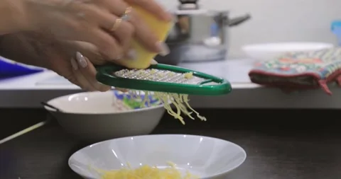 Cheese grater cooking Video stock 144791316