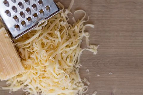 Cheese with a Grater. flat lay Stock-Fotos