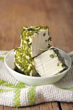 Cheese with herbs Stock Photos