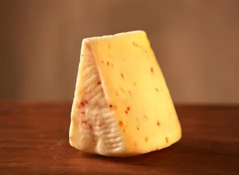Cheese with hot pepper Stock Photos