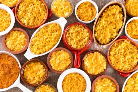 Cheese macaroni served conceptually on table cloth Stock Photos