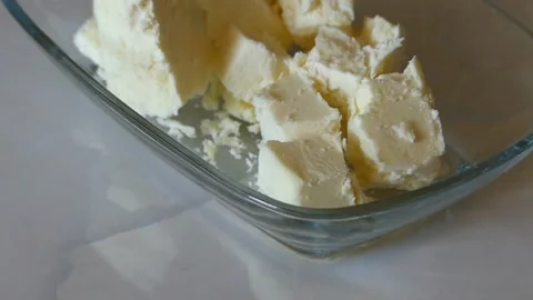 Cheese made from natural fat cow's milk, on a close-up plate Stock Footage 166322642