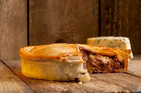 Cheese Meat Pie with a Slice Missing Stock Photos