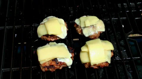 Cheese melting on a turkey burger Stock Footage 36804634