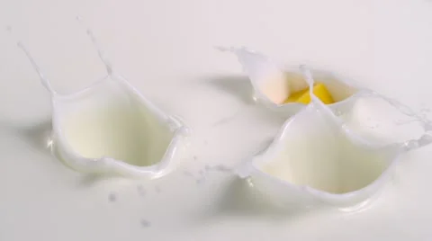 Cheese in milk, Slow Motion Stock Footage 10863105