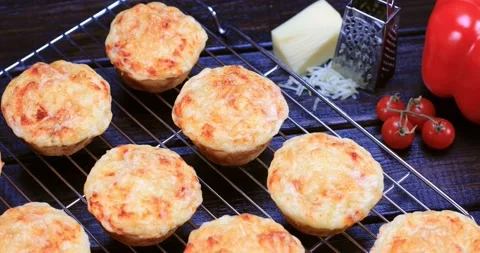 Cheese muffins cooling on the rack Stock Footage 163433237