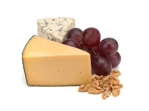 Cheese, nuts, grapes on white background, close up Stock Photos