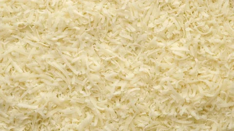 Cheese parmesan grated close up, rotating 動画素材 136502063