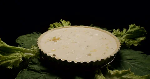 A Cheese Pie, Quiche, Being Prepared, Cooking, Seasoning, Pouring Cheese Stock Footage 242436812