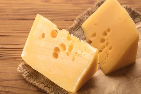 Cheese pieces closeup Stock Photos