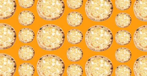 Cheese pizza pattern design on orange background Stockfoto's