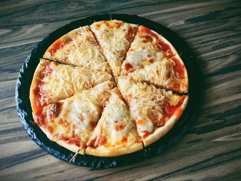 Cheese pizza Stock Photos