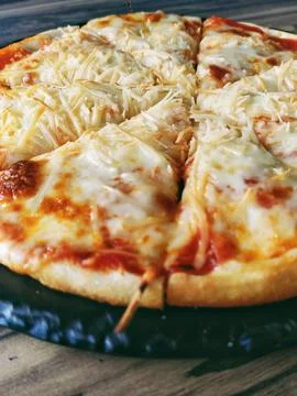 Cheese pizza Stock Photos