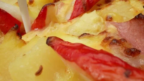 A cheese pizza with pineapple, and crab sticks in macro video. 4K. Stock Footage 263700545