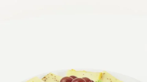 Cheese plate with grapes Stock Footage 8571417