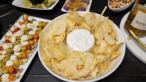 Cheese platter and bite size foods including sushi bar Stock Photos