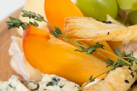Cheese platter closeup. Stock Photos