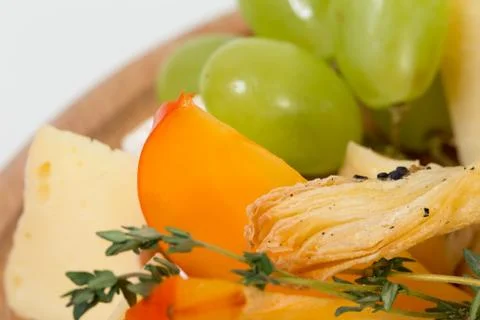 Cheese platter closeup. Stock Photos