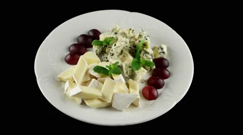 Cheese platter with different sort of cheese with noble mould, loop, top view Stock Footage 61707560